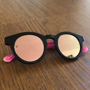 Sunday Somewhere x Happy Socks sunglasses.